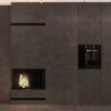 Dekton Bromo rodeando chimenea y paredes