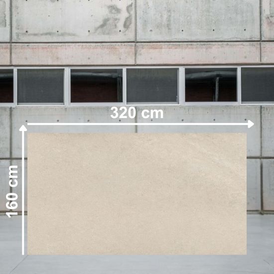Losa grande de Arklam Bateig Verona beige de 320x160 cm en almacén industrial.