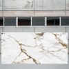 Losa grande de encimera Arklam Calacatta Gold, material duradero porcelánico con vetas doradas para instalaciones en Málaga