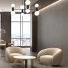 Espacio de lounge moderno con pavimento Arklam Pulpis Natural Silk en Málaga, mobiliario contemporáneo.