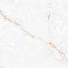 Textura close-up de encimera Arklam Syrac en blanco con vetas doradas, superficie porcelánica resistente para encimeras en Málaga