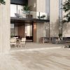Fachada exterior revestida con Arklam Nativa Beige Natural 12 mm para edificios en Málaga.