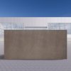 Losa grande de Neolith Barro terracota en entorno industrial al aire libre bajo cielo azul.