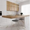 Encimera Blaker Venatino Gold blanca veteada con jarra, frutas y gabinetes de madera en cocina moderna.