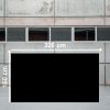 Losa grande de Blaker Negro Sólido 320x160 cm negra uniforme en almacén industrial.