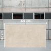 Losa grande de Venux Bellissima Beige 320x160 cm beige veteado en almacén industrial.