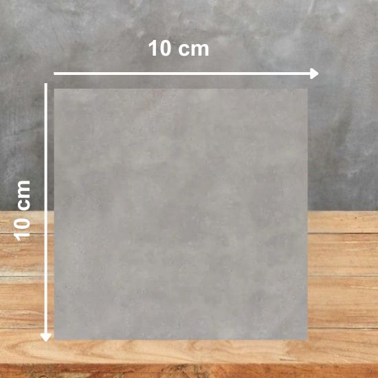 Muestra 10x10 cm de Venux Bellissima Grigio gris con vetas grises sobre fondo gris.